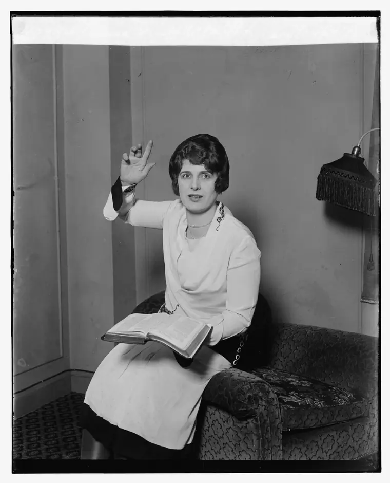 Studio portrait of Aimee Semple McPherson, photographed February 1927, facing the camera.