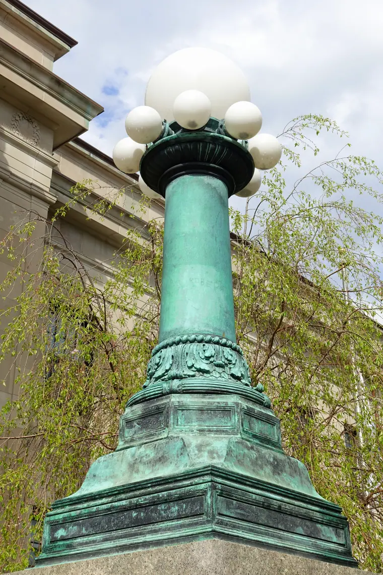 An ornamental iron lamp standard outside the Norfolk County Courthouse in Dedham, Massachusetts.