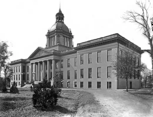 Glass-plate photograph of the domed Florida State Capitol around 1902, with bare grounds in front.