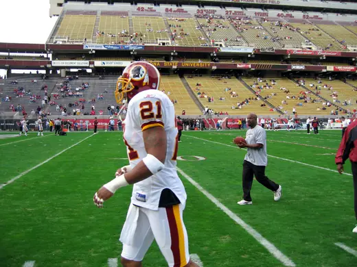 Safety Sean Taylor in a number 21 jersey on the sideline before a game in December 2005.