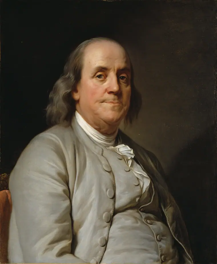Oil portrait of an elderly Benjamin Franklin in a brown coat, seated and facing slightly left, painted around 1785.