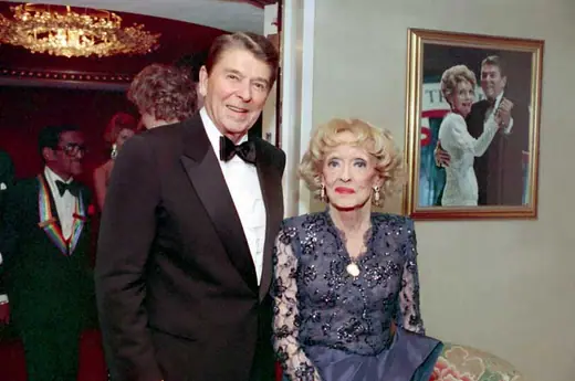 An actress meeting the President at a White House event in December 1987.