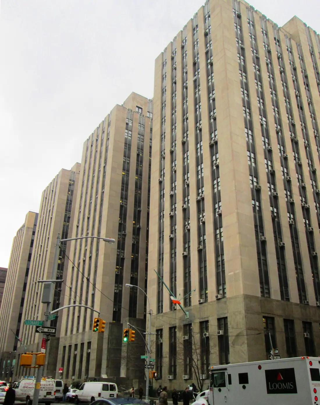The Art Moderne Criminal Courts Building at 100 Centre Street in Manhattan, with the Bridge of Sighs at left.