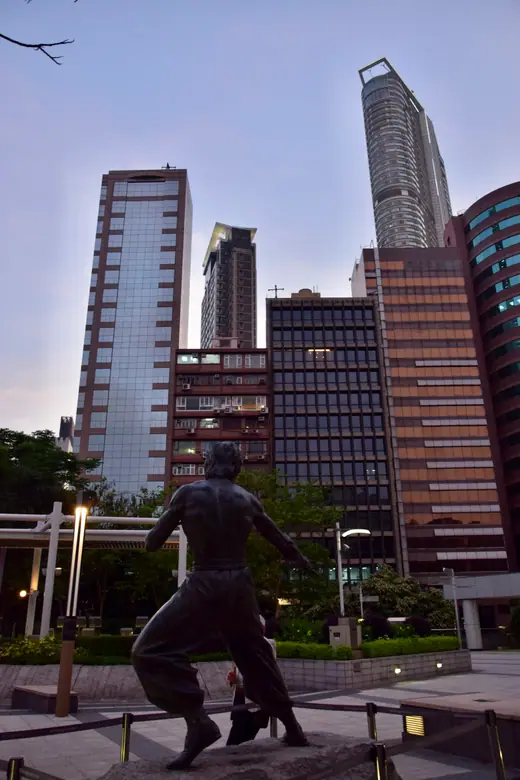 The bronze Bruce Lee statue in a fighting stance on the Avenue of Stars in Hong Kong.