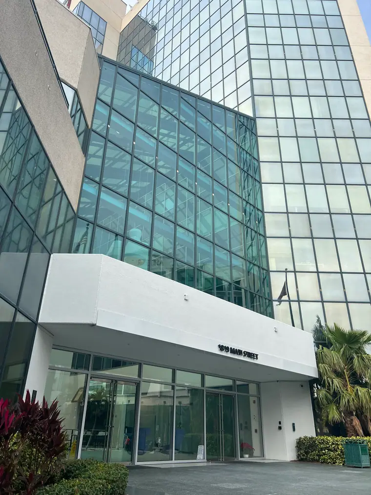 An office building on Main Street in downtown Sarasota, Florida, photographed from street level.