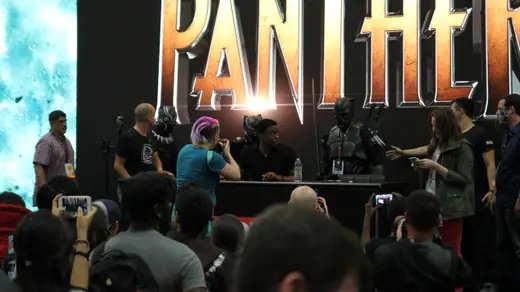 Chadwick Boseman signing autographs at San Diego Comic-Con International, July 2016.
