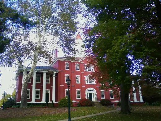 Bentley Hall at Allegheny College seen from the lawn on an autumn day.