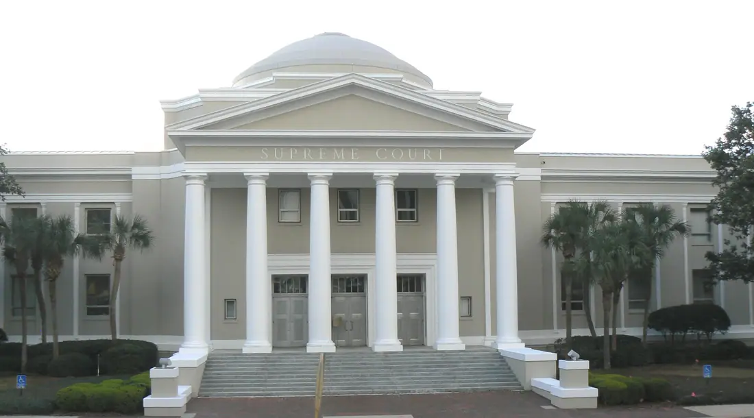 The Florida Supreme Court Building in Tallahassee, a white classical structure with a columned portico.