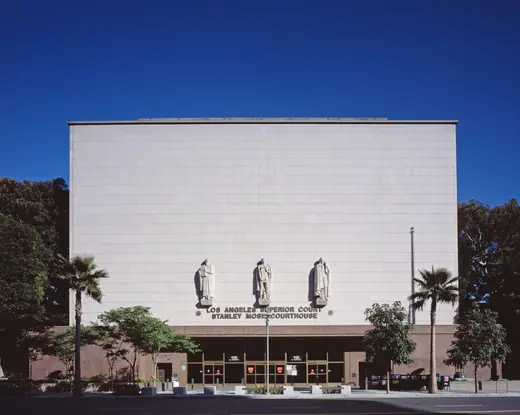 The Grand Avenue facade of the Stanley Mosk Courthouse in downtown Los Angeles, a 1958 building with bas-relief panels.