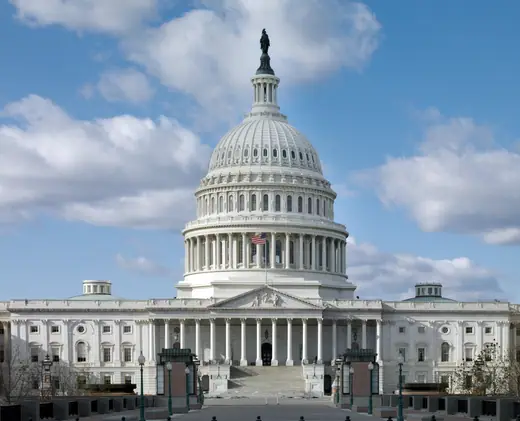 The United States Capitol seen from the west, with the dome above the Mall.