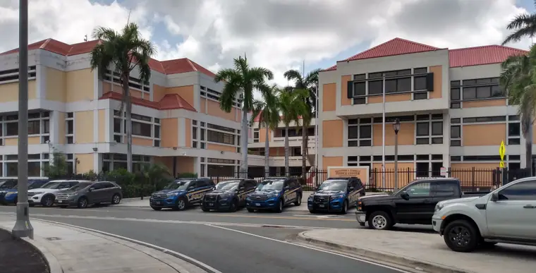 A low modern government building complex under a bright sky in St. Thomas, US Virgin Islands.