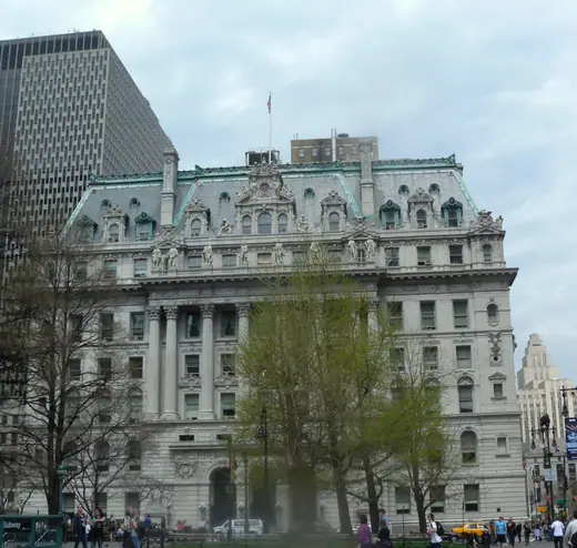 31 Chambers Street photographed under an overcast sky, showing the full width of the courthouse front.