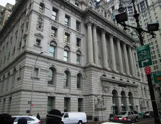 The Surrogate's Courthouse and Hall of Records seen from the west, its granite facade rising above Chambers Street.