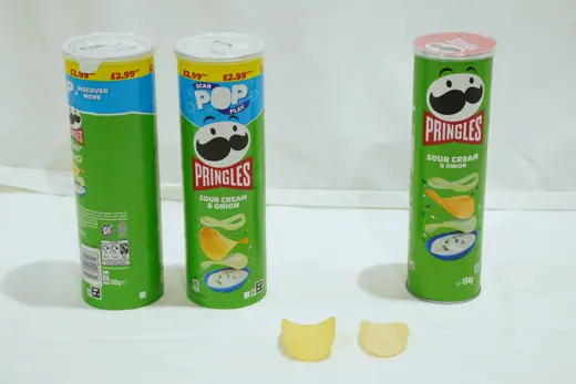 Two Pringles tubes of different sizes photographed side by side.