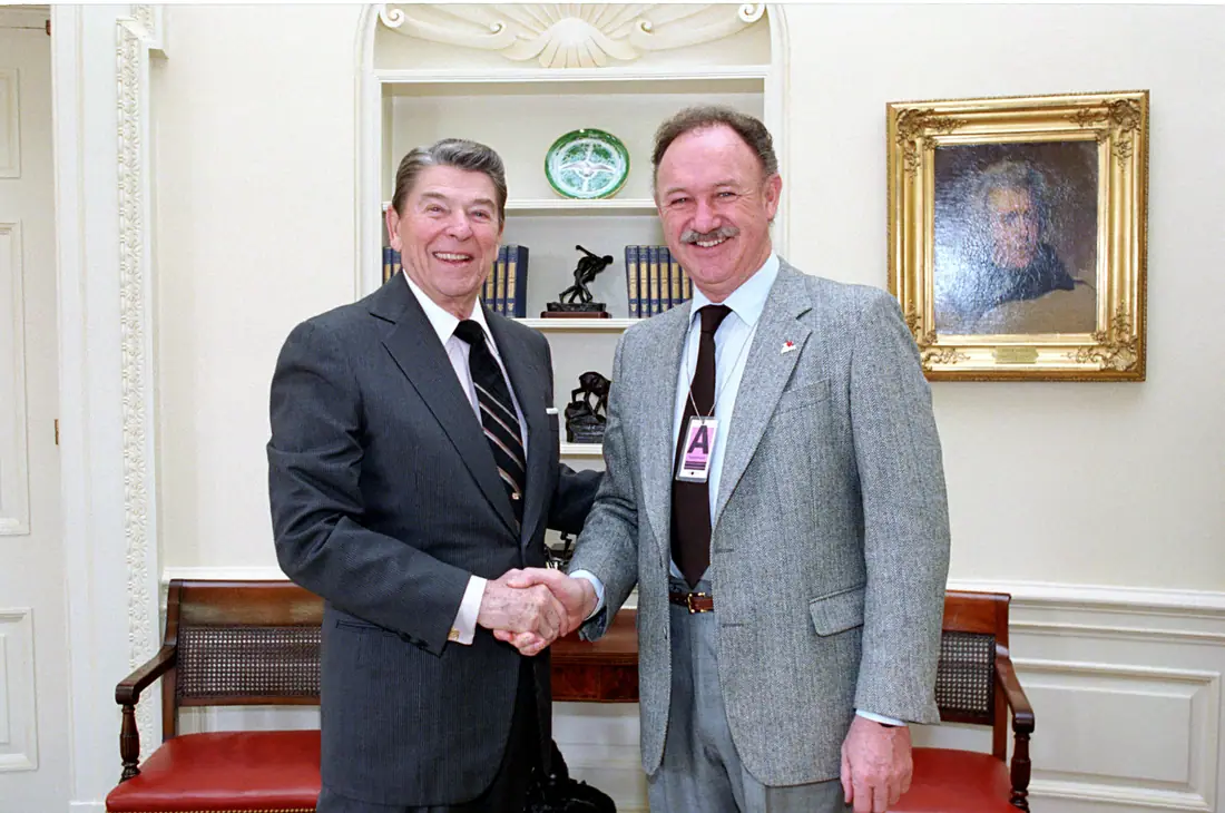 President Ronald Reagan with Gene Hackman during a photo opportunity in the Oval Office, February 6, 1987.