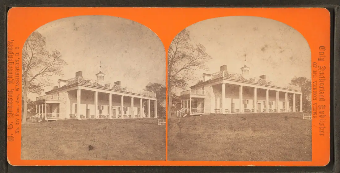 Wide albumen photograph of the Mount Vernon mansion seen from the lawn, with its two-storey colonnaded piazza facing the river.