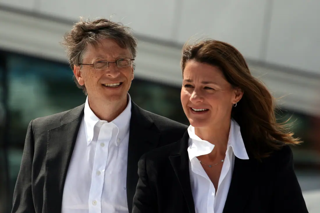 Bill and Melinda Gates seated at a public event at the Oslo Opera House.