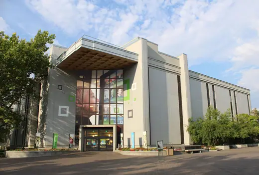 The front facade and entrance of the Family History Library building.
