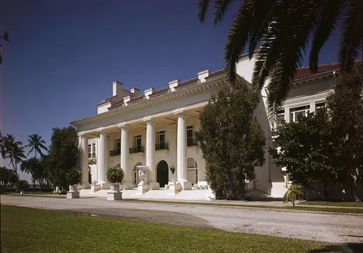 Black-and-white architectural survey photograph of the front elevation of a large classical mansion.