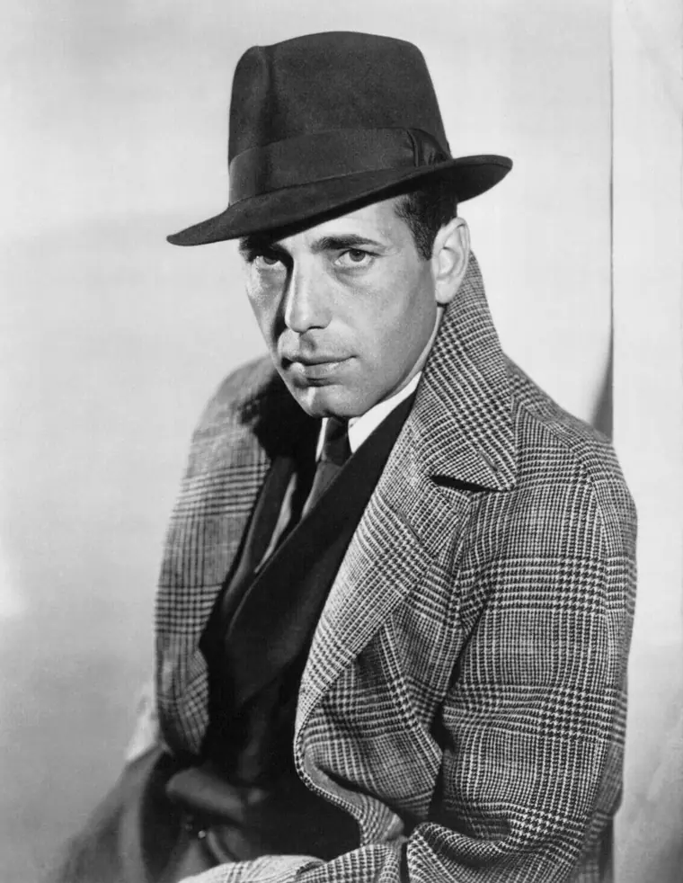 Studio portrait of an actor in a suit and tie, late 1930s.