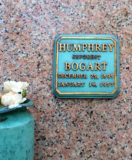 A memorial marker in a garden of a California memorial park.