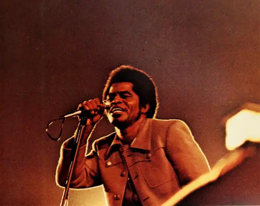 James Brown performing on a stage at Tulane Stadium, New Orleans, October 1970.