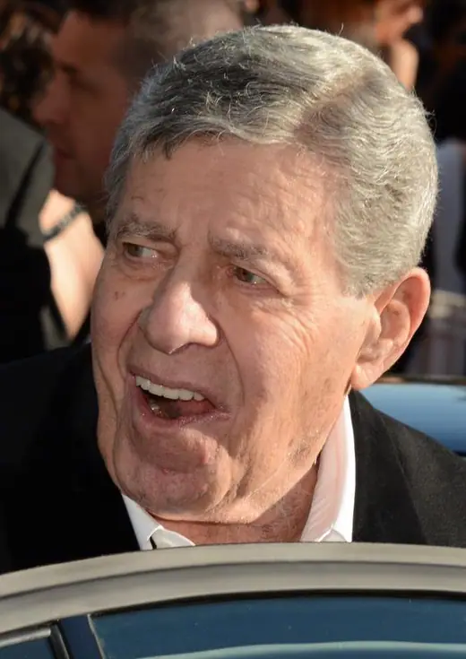 An elderly comedian photographed at a film festival in 2013.