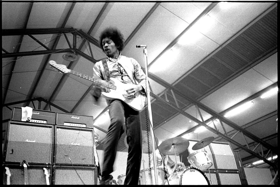 Jimi Hendrix playing guitar on stage at the Hippy Happy youth fair in Ahoy, Rotterdam, November 1967.
