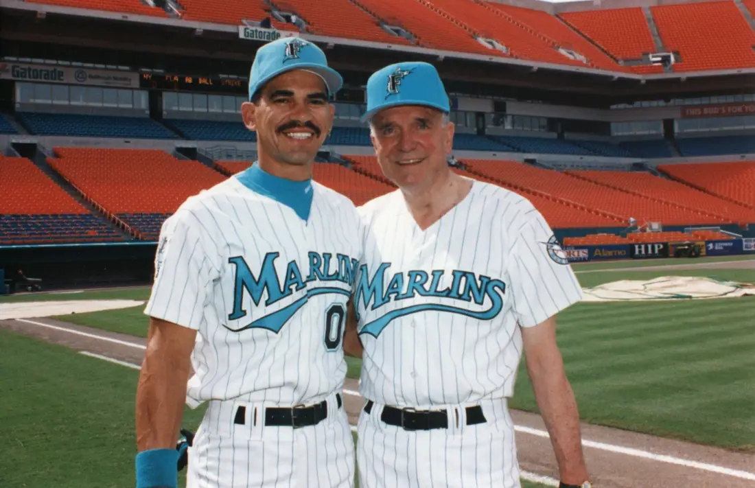 Governor Lawton Chiles standing with Florida Marlins catcher Benito Santiago at Joe Robbie Stadium in 1993.