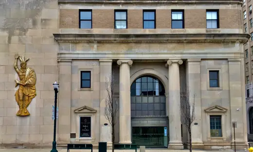 The neoclassical entrance of the former Pontiac Commercial and Savings Bank Building in Pontiac, Michigan.