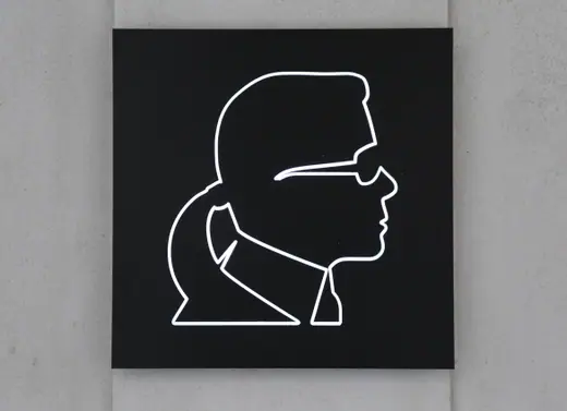 The Karl Lagerfeld name in metal lettering on a store facade in Munich.
