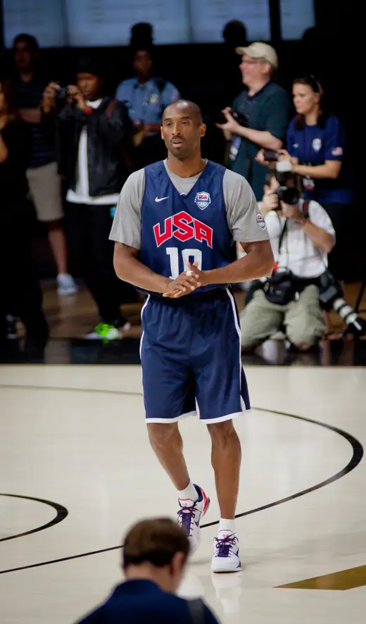 Player in a USA national team jersey during an Olympic basketball game.