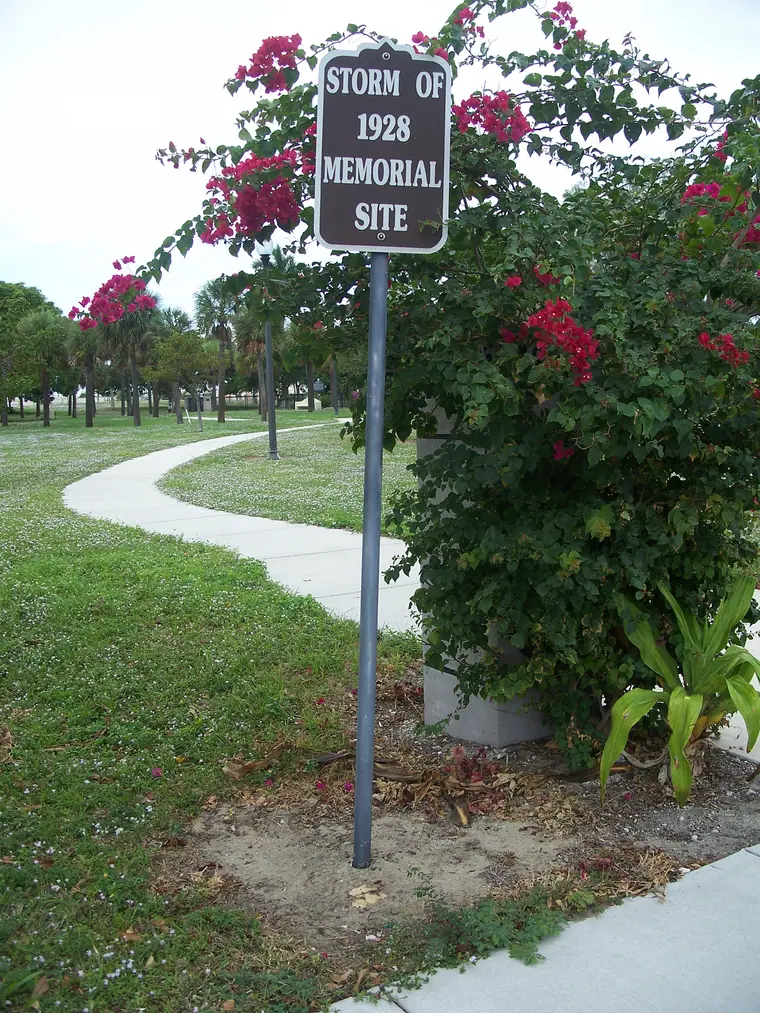 The sign marking the Hurricane of 1928 African-American Mass Burial Site at 25th Street and Tamarind Avenue, West Palm Beach.