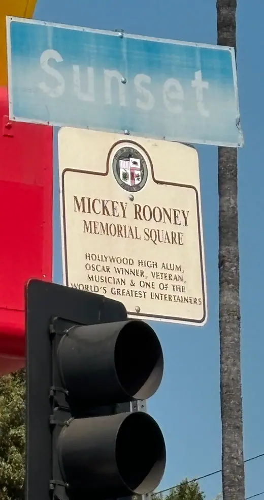 Street sign reading Mickey Rooney Memorial Square in Hollywood, Los Angeles.