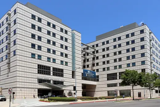 The stone and glass facade of the Ronald Reagan UCLA Medical Center in Westwood, Los Angeles.