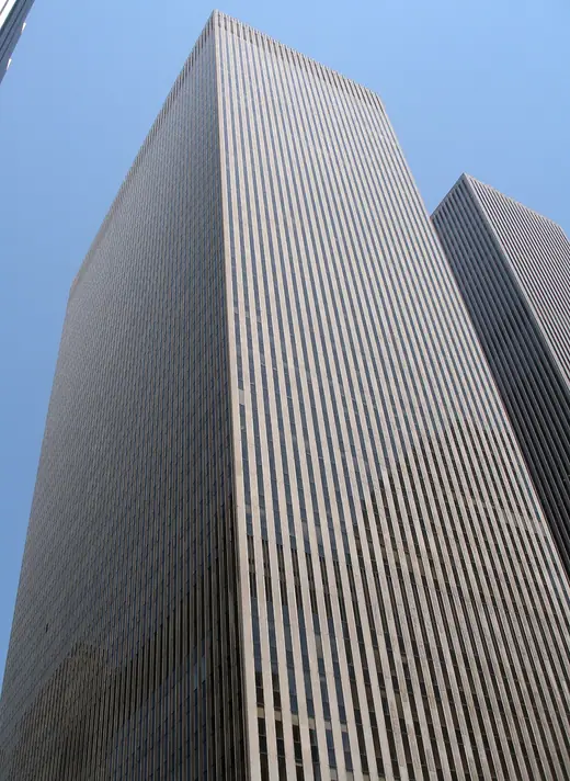 The tower at 1211 Avenue of the Americas in Manhattan seen from street level looking up.
