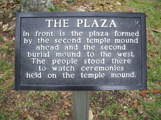 An interpretive sign describing the plaza area at Crystal River Archaeological State Park.