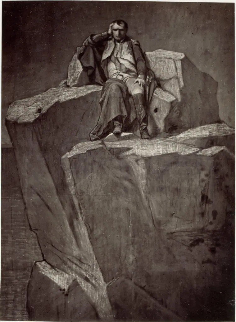 Photographic reproduction of Paul Delaroche's painting of Napoleon seated in exile at Saint Helena, arms folded, in a dark coat.