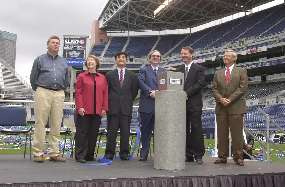 Officials including Paul Allen at the ribbon-cutting for the new Seahawks stadium in Seattle.