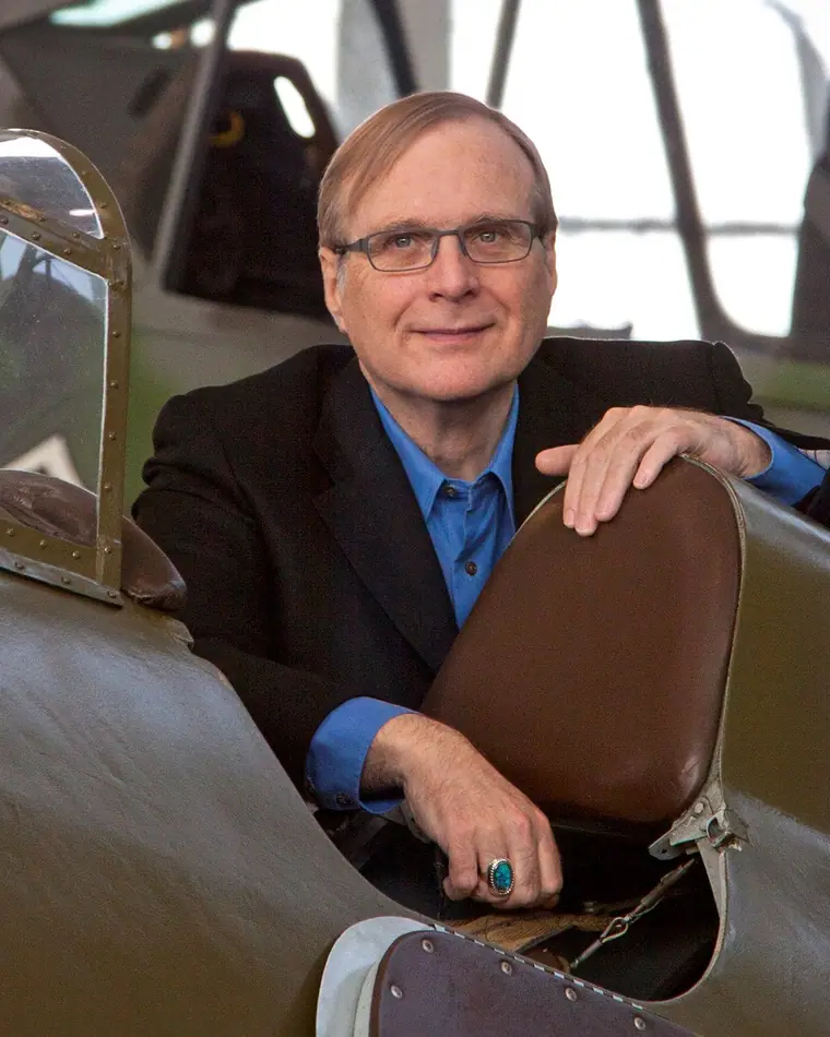 Paul Allen photographed at the Flying Heritage Collection, wearing a dark jacket.