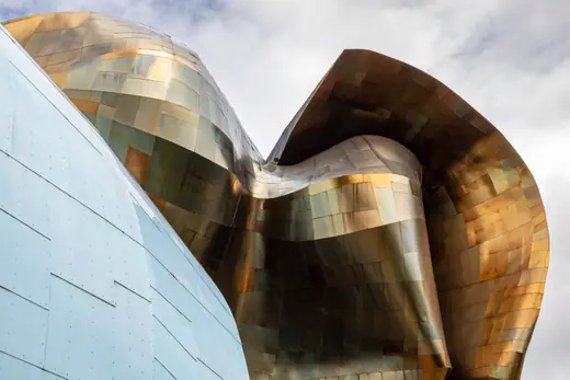 The curved multicoloured metal facade of the Museum of Pop Culture in Seattle.