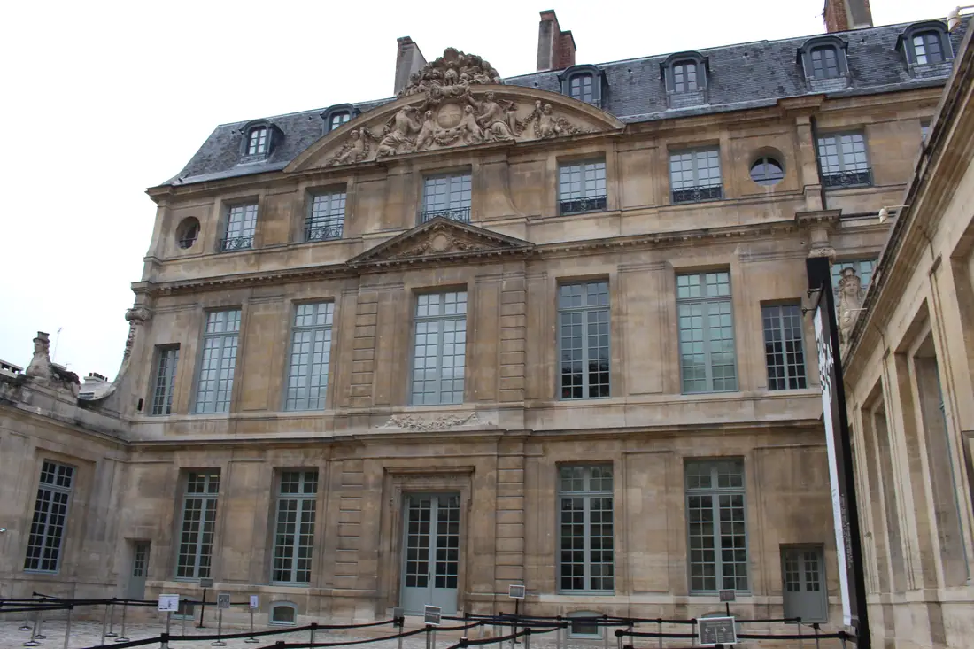 The stone facade of the Hôtel Salé in the Marais, Paris, home of the Musée Picasso.