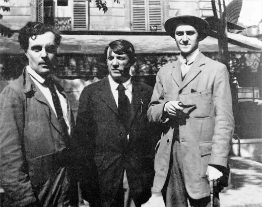 Modigliani, Picasso and André Salmon standing outside the Café de la Rotonde in Paris.