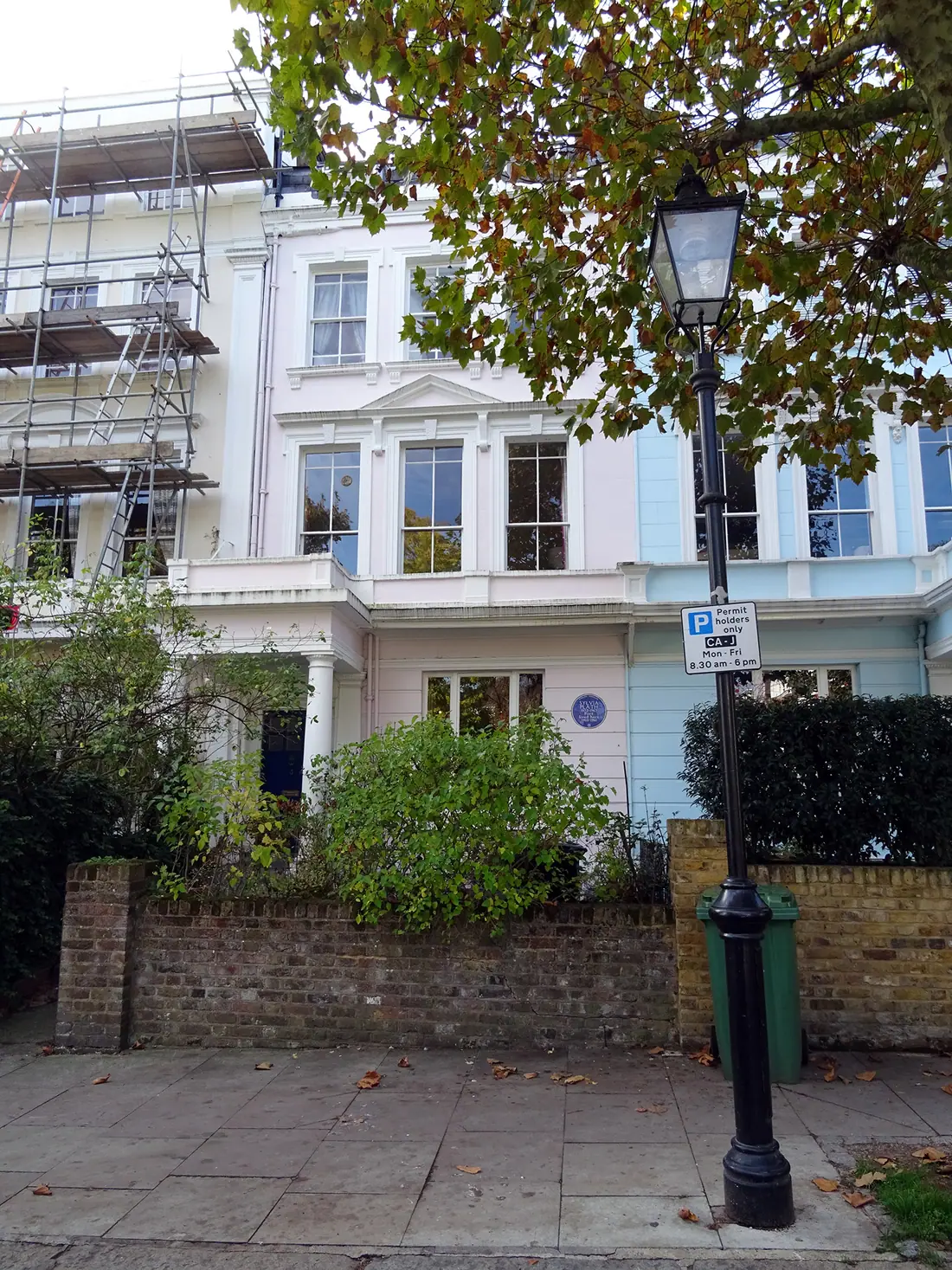 A London terraced house at 3 Chalcot Square, Primrose Hill, with a blue plaque on the facade.