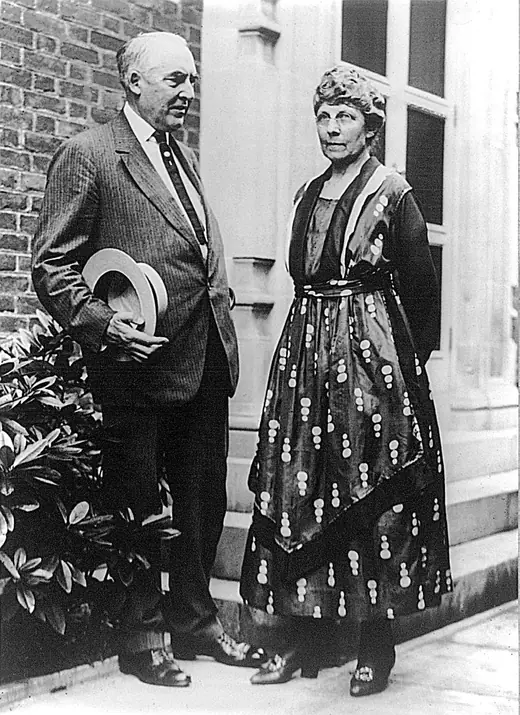 President Warren G. Harding standing beside First Lady Florence Harding.