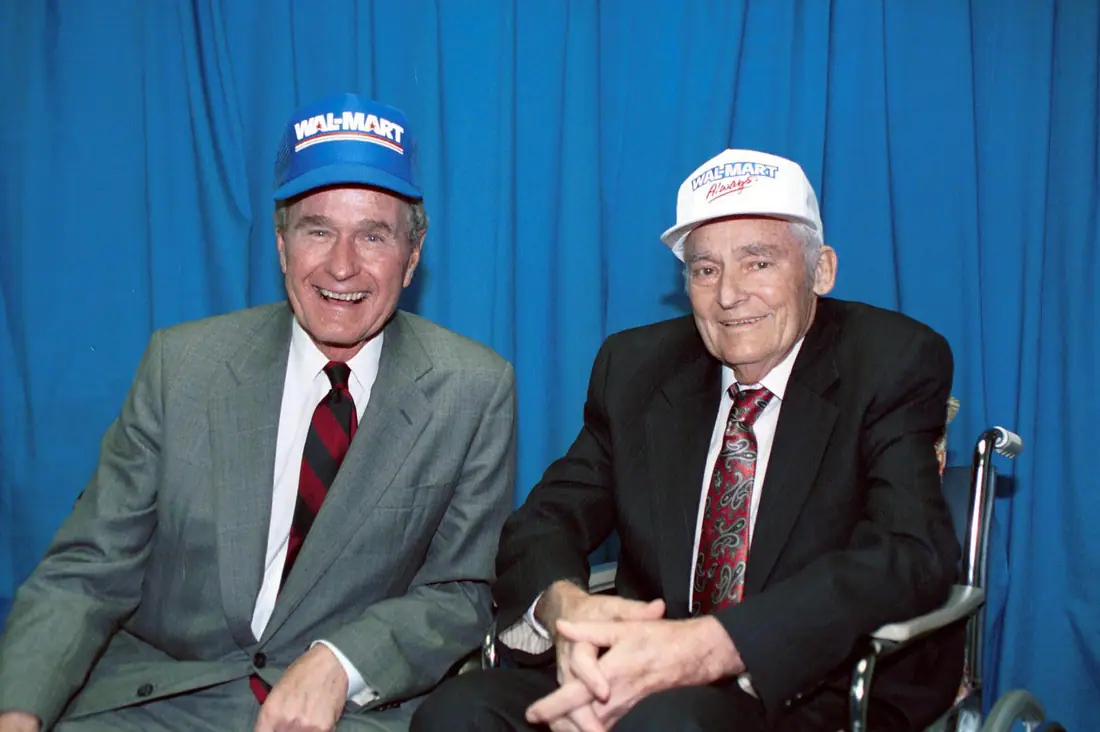 President George H. W. Bush presenting the Medal of Freedom to Sam Walton at a ceremony in Bentonville, Arkansas.