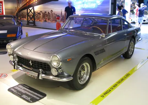 Front-left view of a 1964 Ferrari 330 America, chassis 5121GT, on display at the Museo Ferrari.