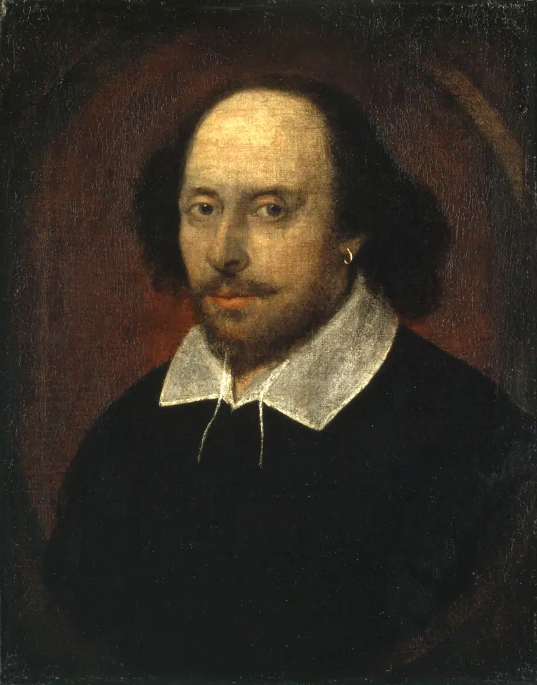Oil portrait of a bearded man in a black doublet with a white collar and a gold earring, known as the Chandos portrait of William Shakespeare.
