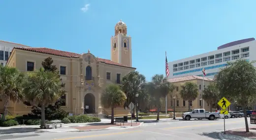 A wide panoramic view of the Sarasota County Courthouse complex and its grounds.