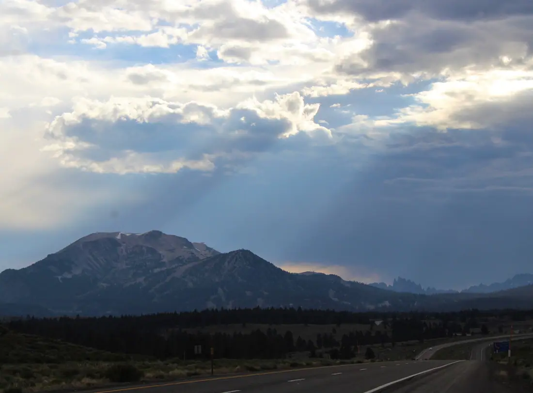 Mammoth Mountain and the Minarets of the Sierra Nevada at sunset, seen across Inyo National Forest.